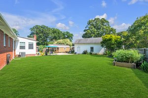 Large Backyard with raised garden beds