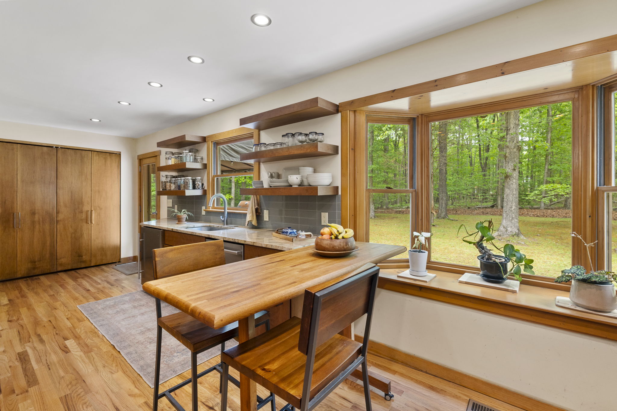 Eat in kitchen with space for a table near the huge bay window letting in tons of natural light.
