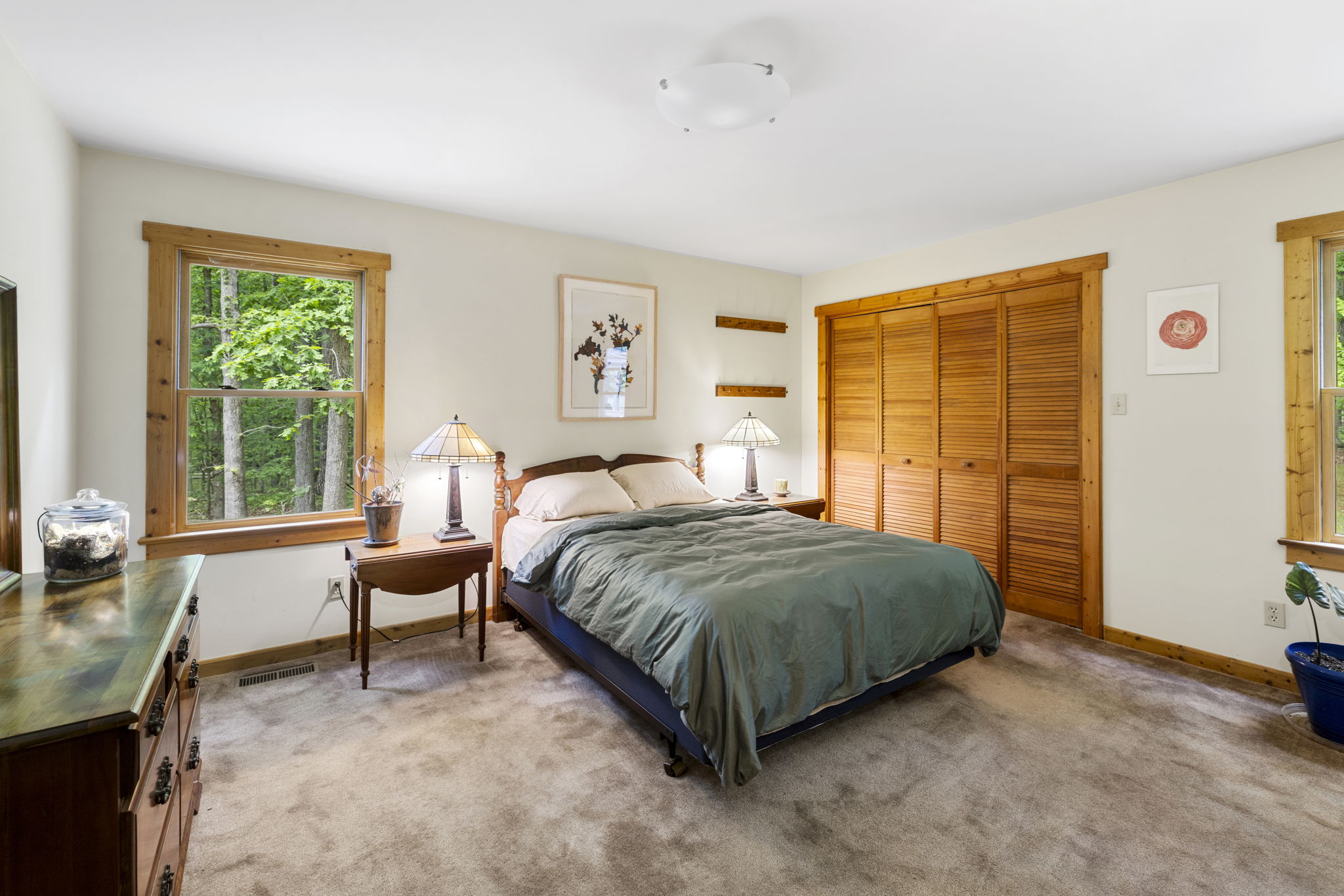 1st floor guest bedroom with large closet.