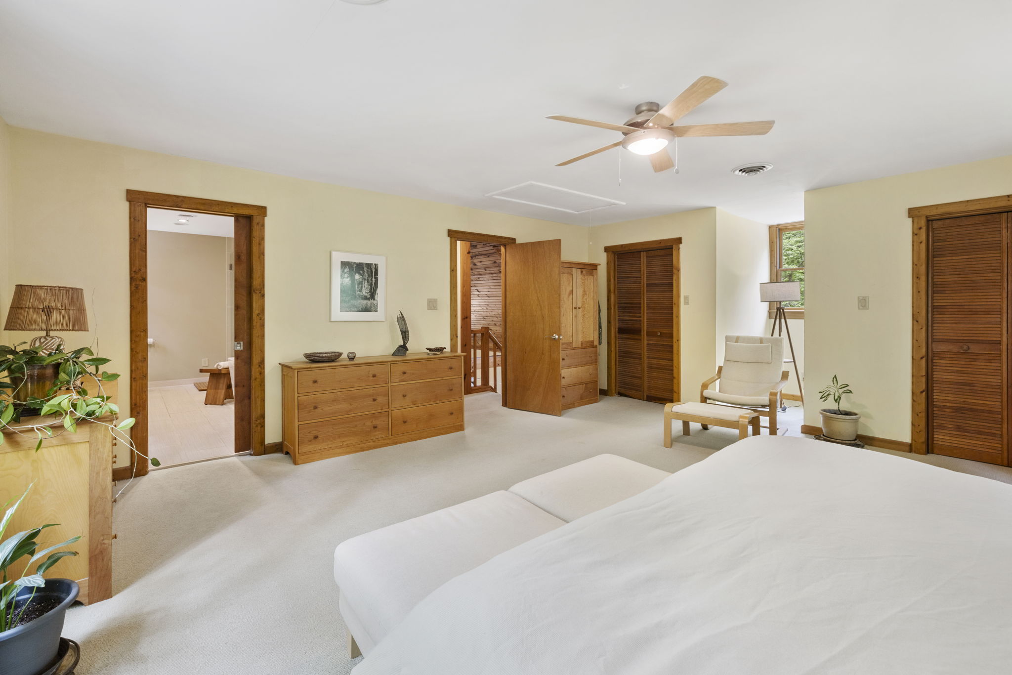 En-suite bath and extensive closet space in primary suite with plenty of room for sitting area.