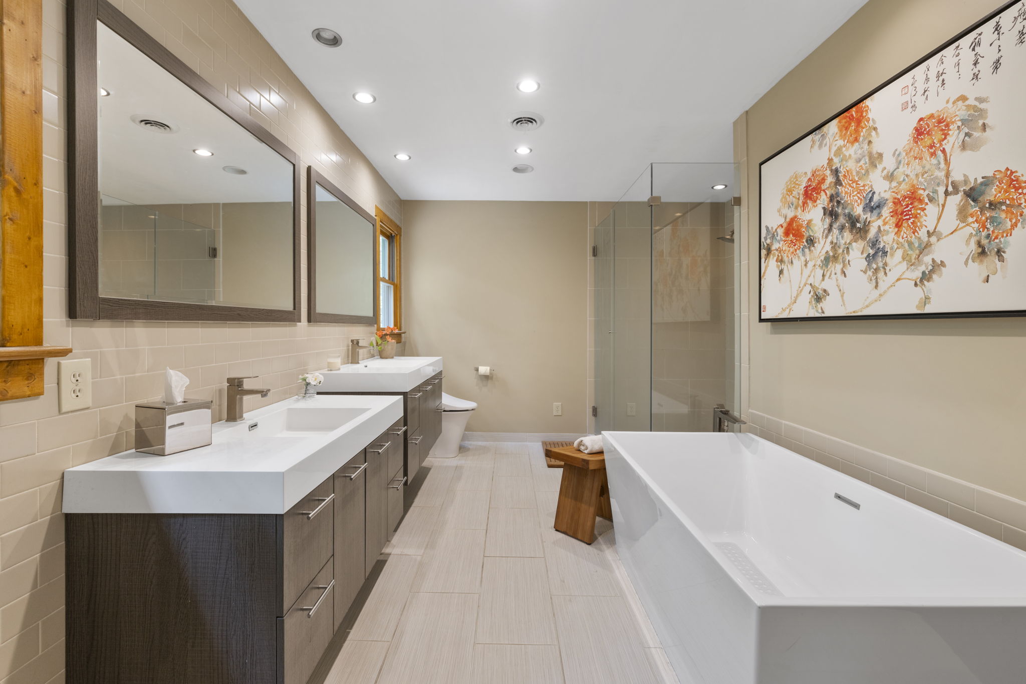 Renovated primary bathroom in 2025 with large stand up shower & bidet style Toto toilet with heated seat.