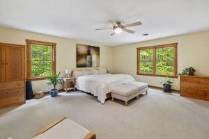 2nd floor primary bedroom with tons of natural light & ceiling fan.