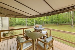 Covered rear deck just off of the kitchen.