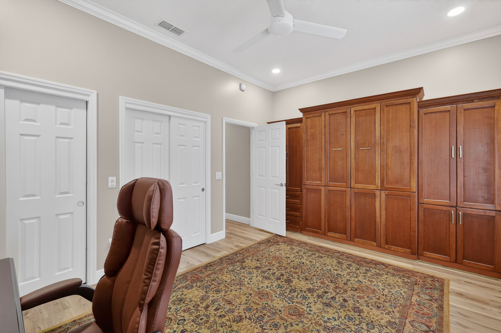 Third Bedroom with Murphy Bed and Built-In Cabinetry