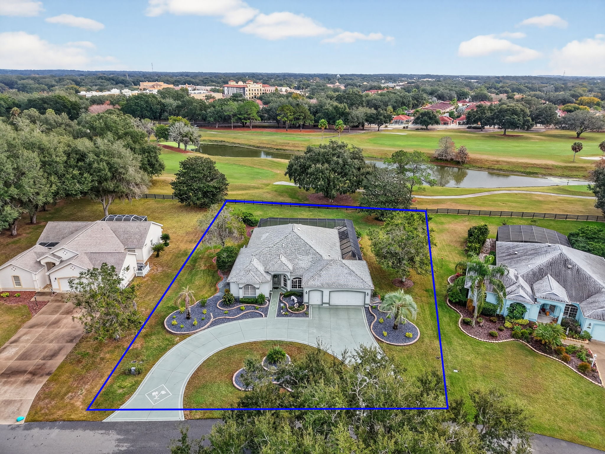Aerial Front Elevation with Property Lines and Water and Golf Front Views