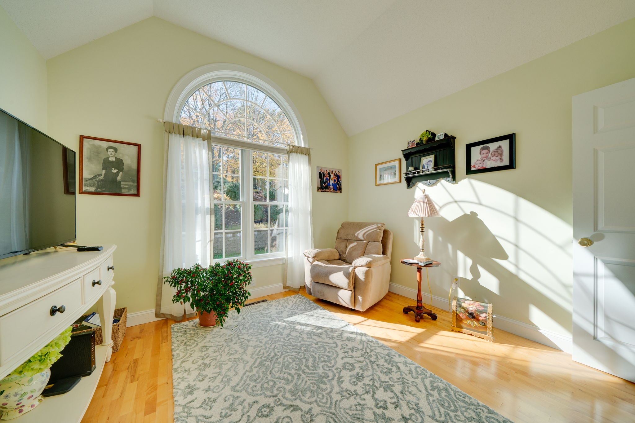 This second Bedroom is at the Front of the House with Vaulted Ceilings and Palladian Window