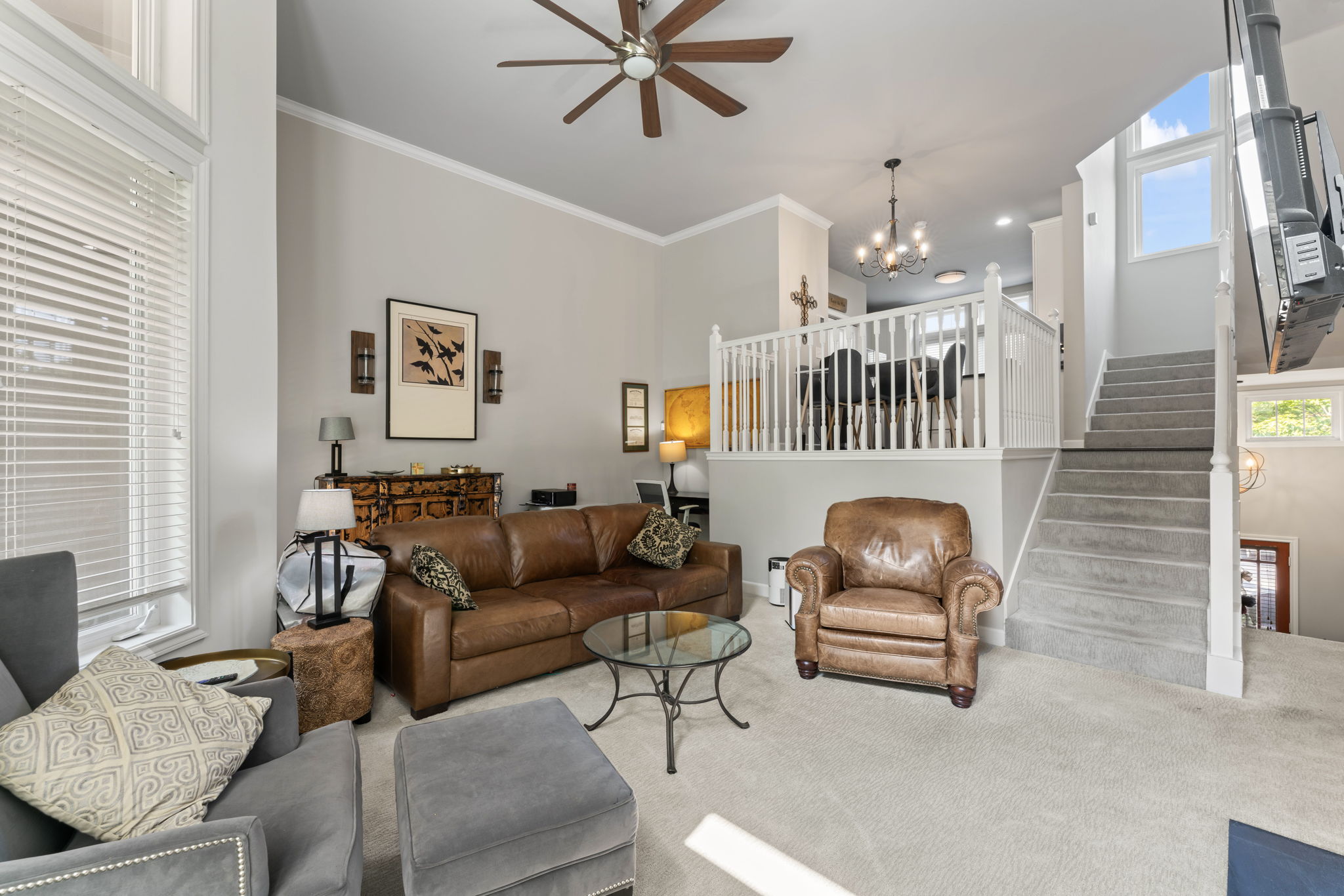 Dining area adjacent to kitchen and overlooks the beautiful family room and nature views!