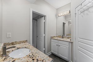 Shared bathroom has separate sinks