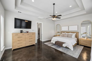 Primary bedroom suite, separate from the other rooms.