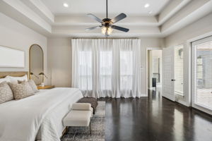 Primary bedroom suite, flooded with natural light.