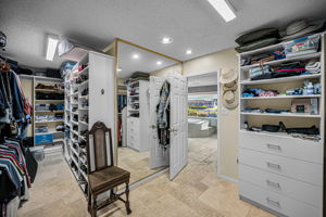 First Floor Primary Bedroom Walk-in Closet1b