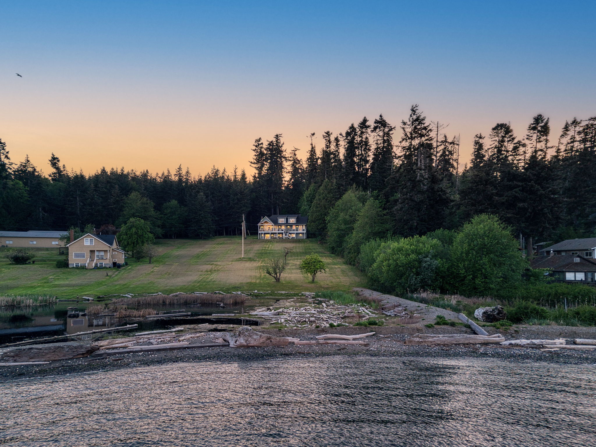 Over 2 acres of no bank waterfront at your disposal...