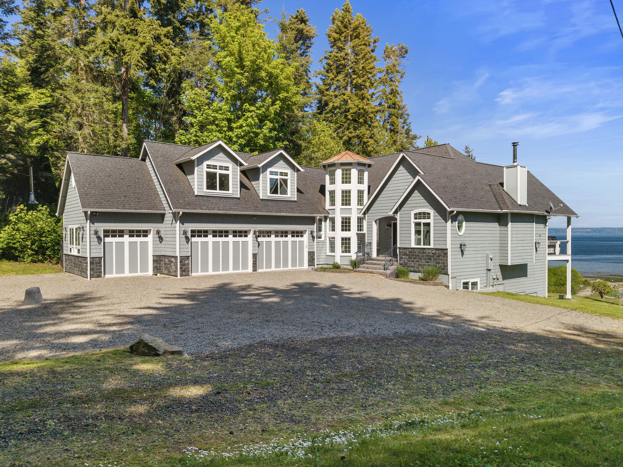 Plenty of parking for RVs, boats and all of your toys with this generous 3 car garage and expansive driveway.