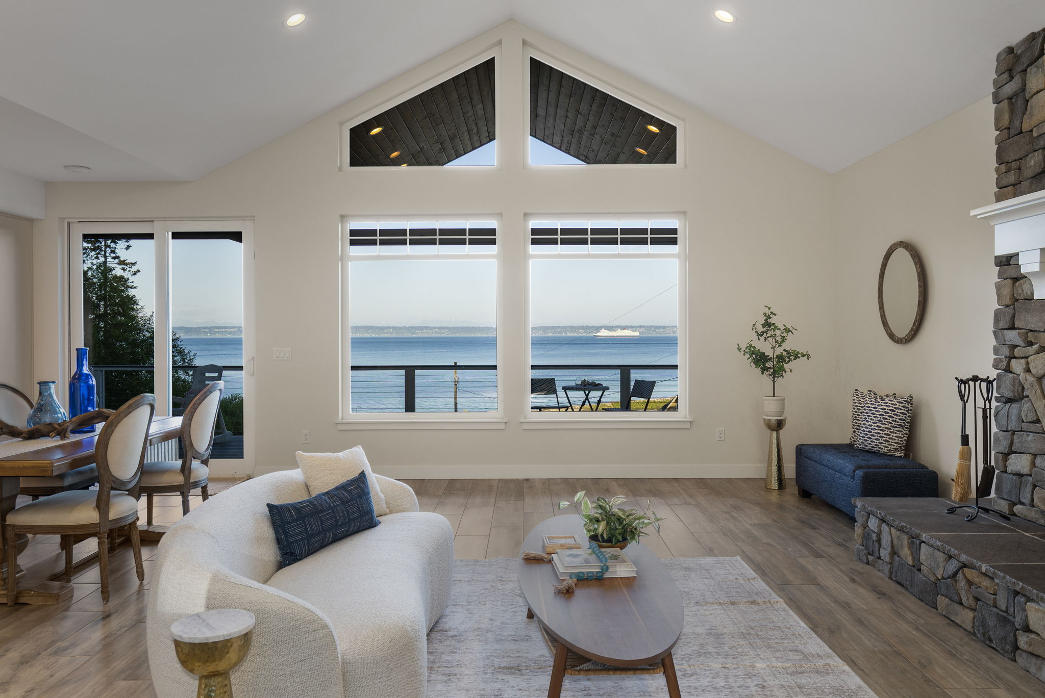 Vaulted ceilings, stone fireplace, in floor radiant heat tile floors and endless views!