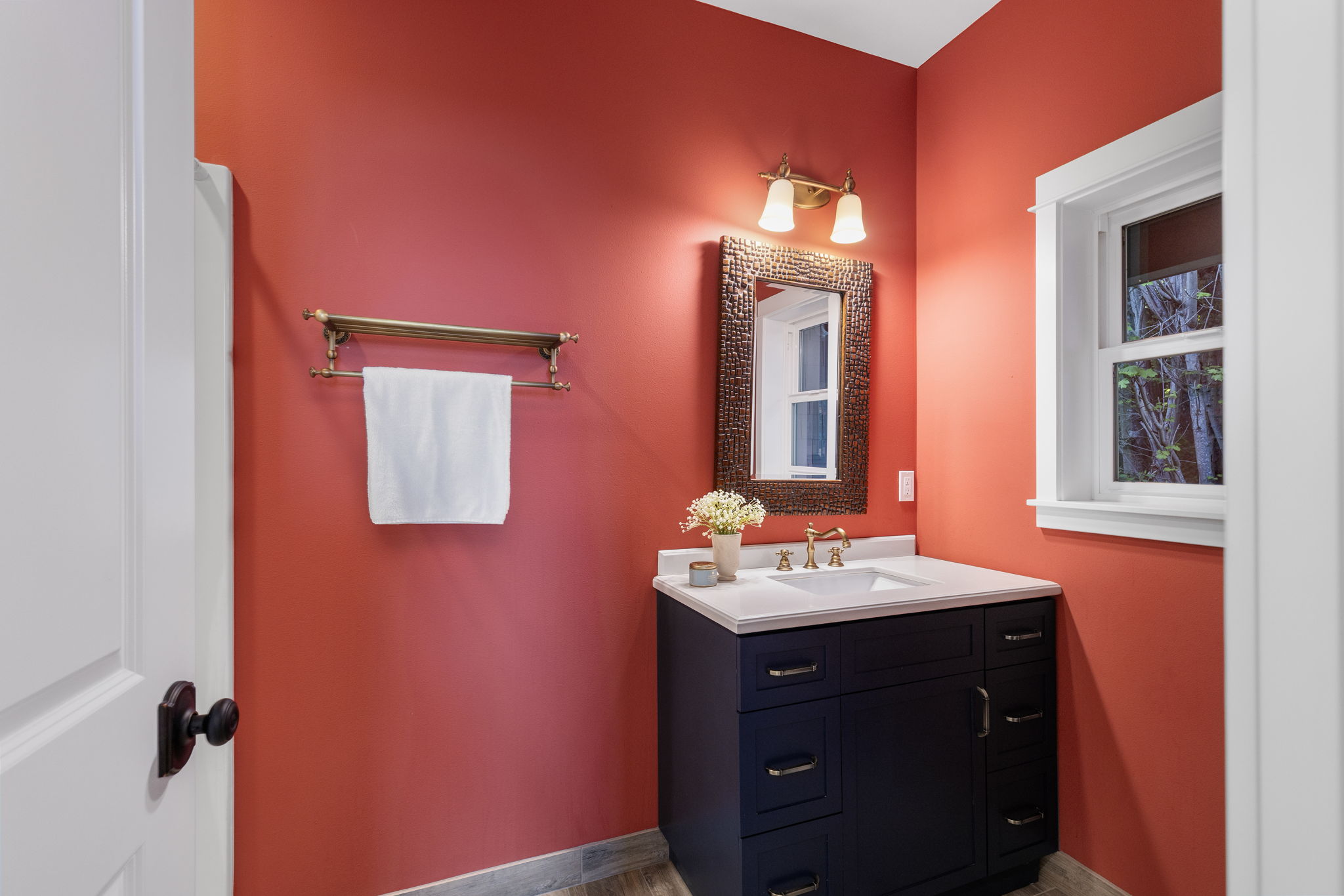 3/4 guest bath on the main floor...shower to the left behind door.
