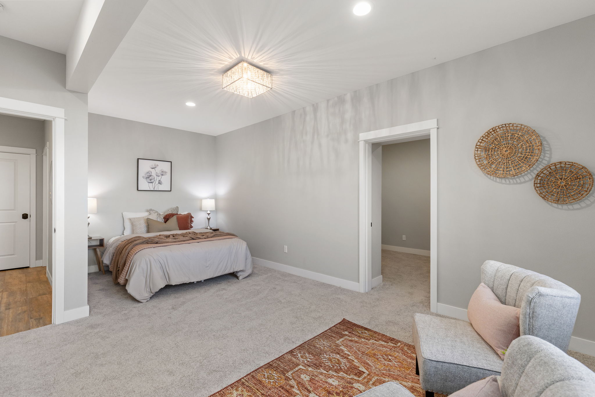Lower level bedroom with ensuite AND water views...through the doorway on the right, a room sized closet!
