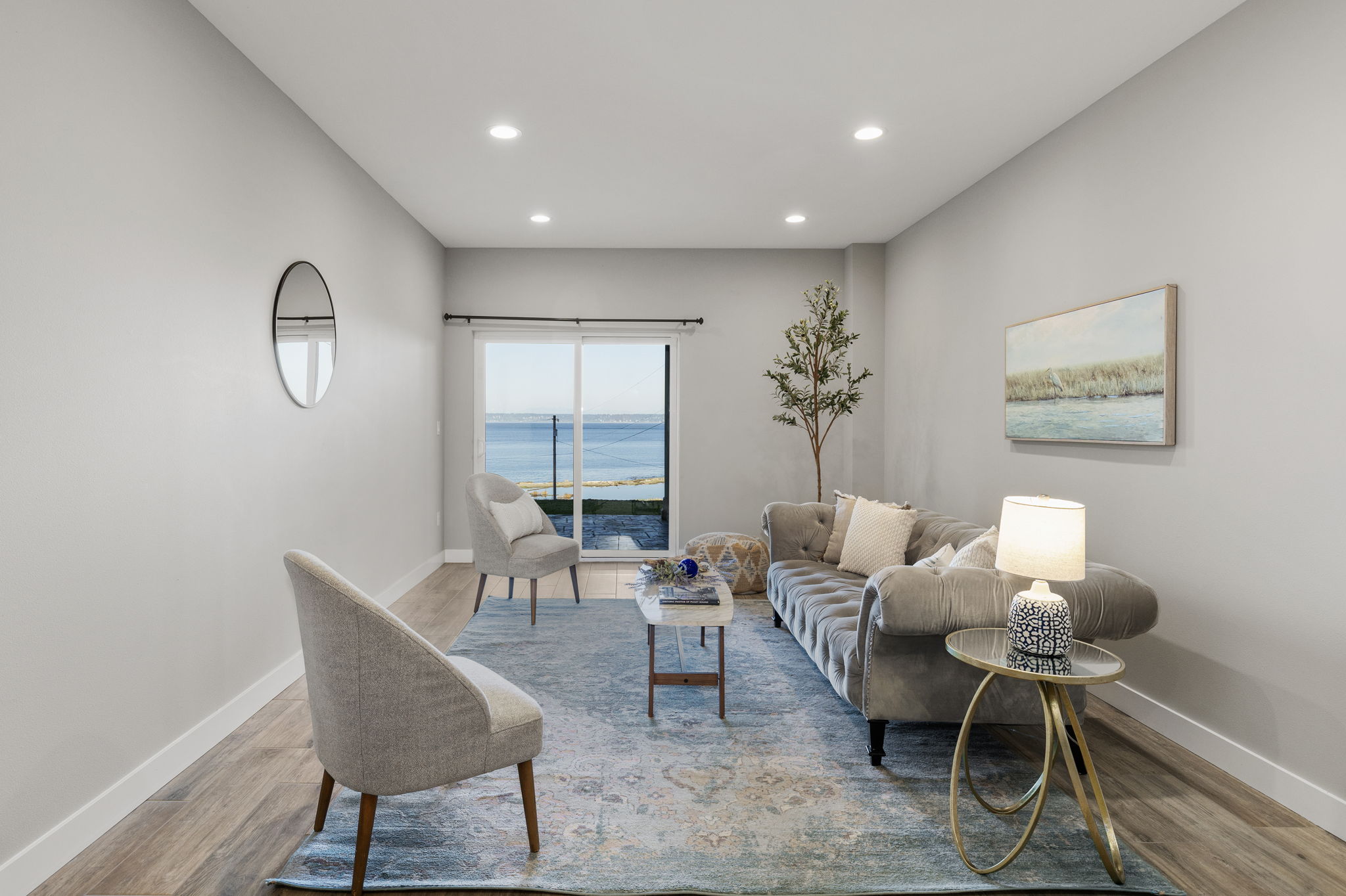 Lower level living space, rec room...how would you use it? Slider to water view covered patio!