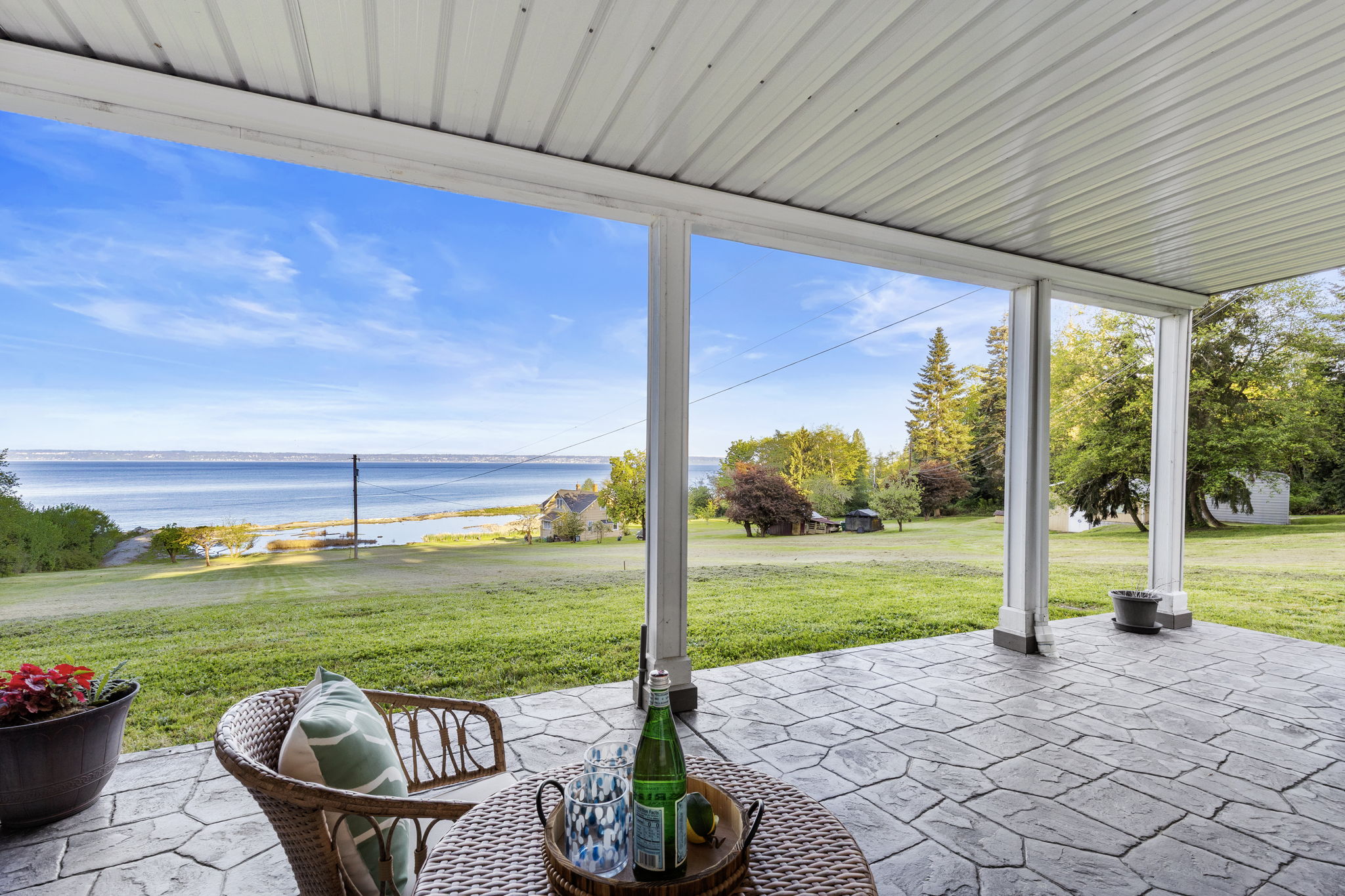 Lower level covered patio off living space/rec room. Enjoy this space rain or shine!