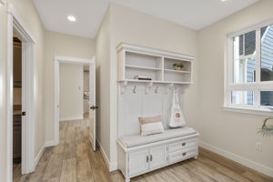 Expansive mudroom off 3 car garage...proper main floor laundry room to the left.