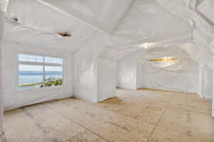 A 1,241 sq ft insulated and plumbed upper level offers future expansion potential. Gorgeous VIEWS! Additional guest quarters, rec room, HUGE primary suite?!?!