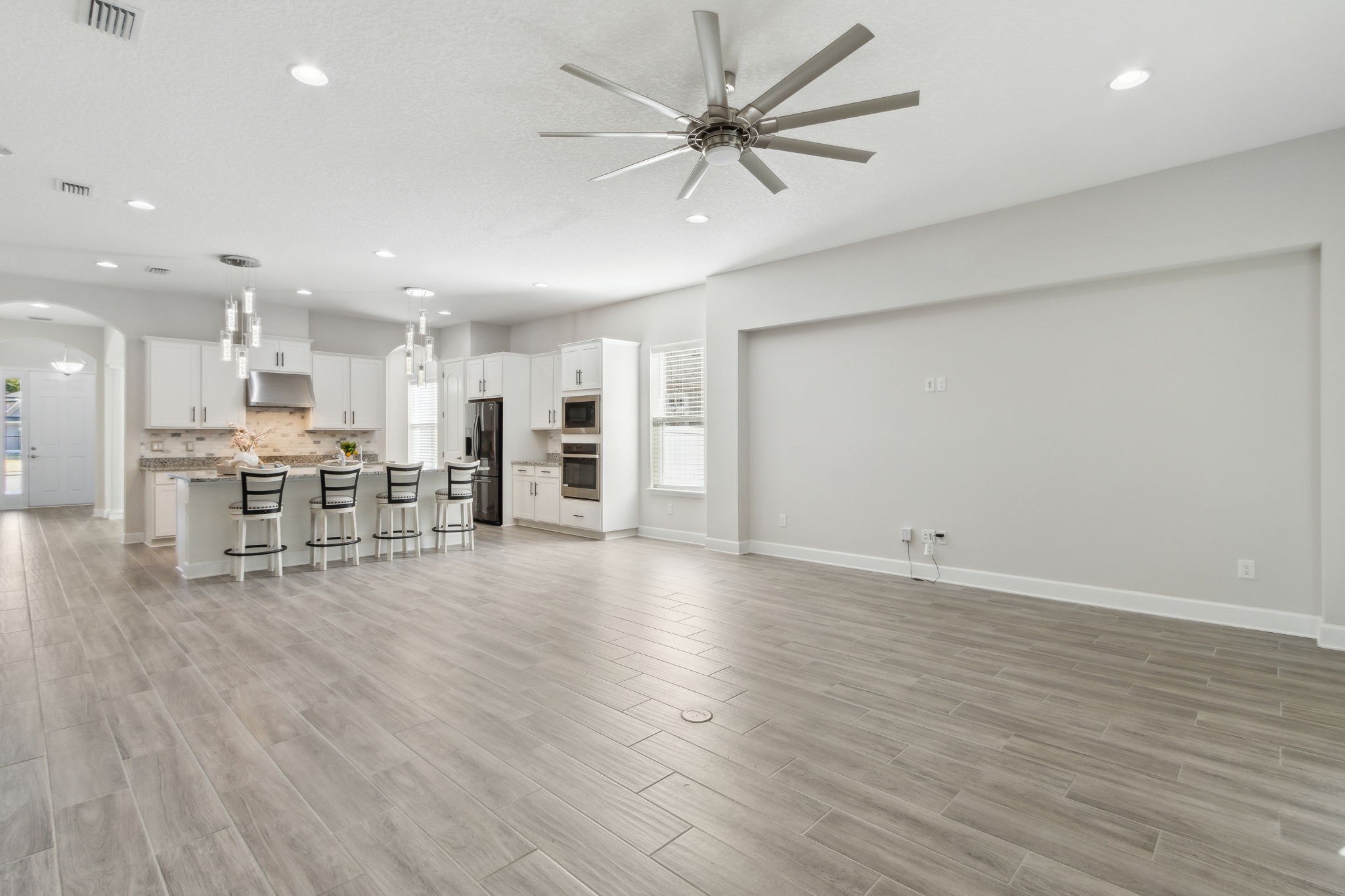 Another highlight: premium wood-plank tile floors in the common areas ...