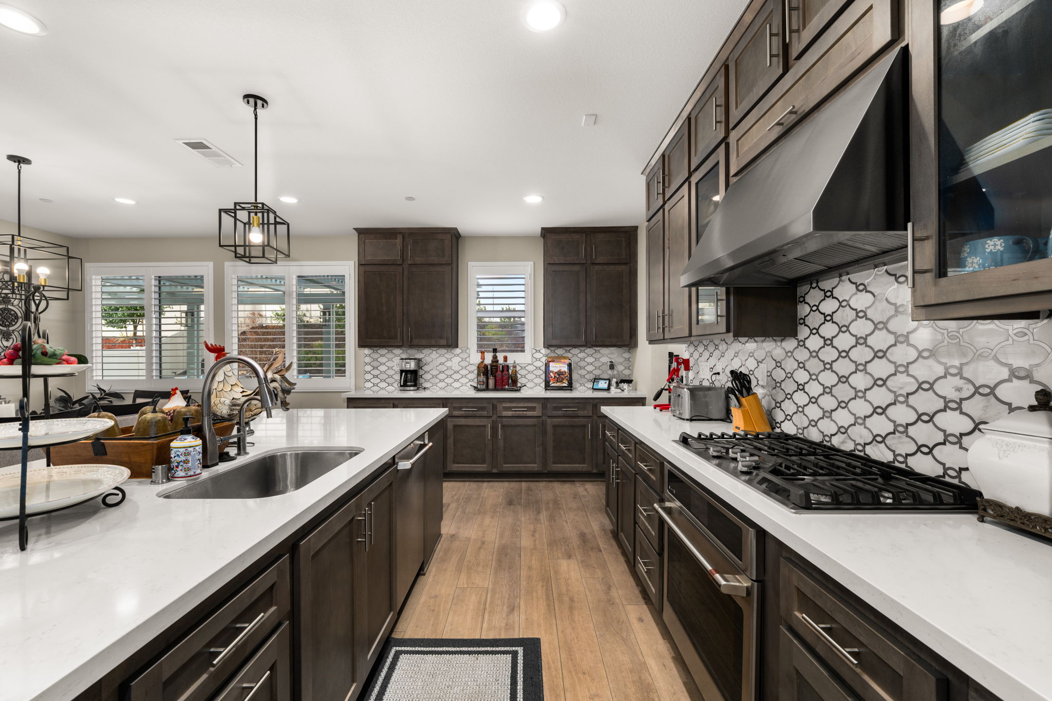 Highly upgraded chef's kitchen with designer backsplash