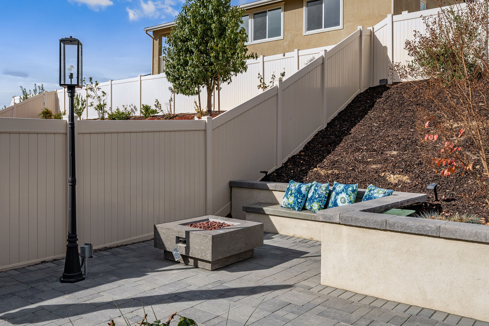 Backyard is an entertainer's dream, featuring a sparkling "spool" (spa/mini pool) with waterfall feature; built in fire pit with built in benches; built in natural gas BBQ island with sink and fridge; pavers & outdoor fans; built in outdoor surround sound speakers