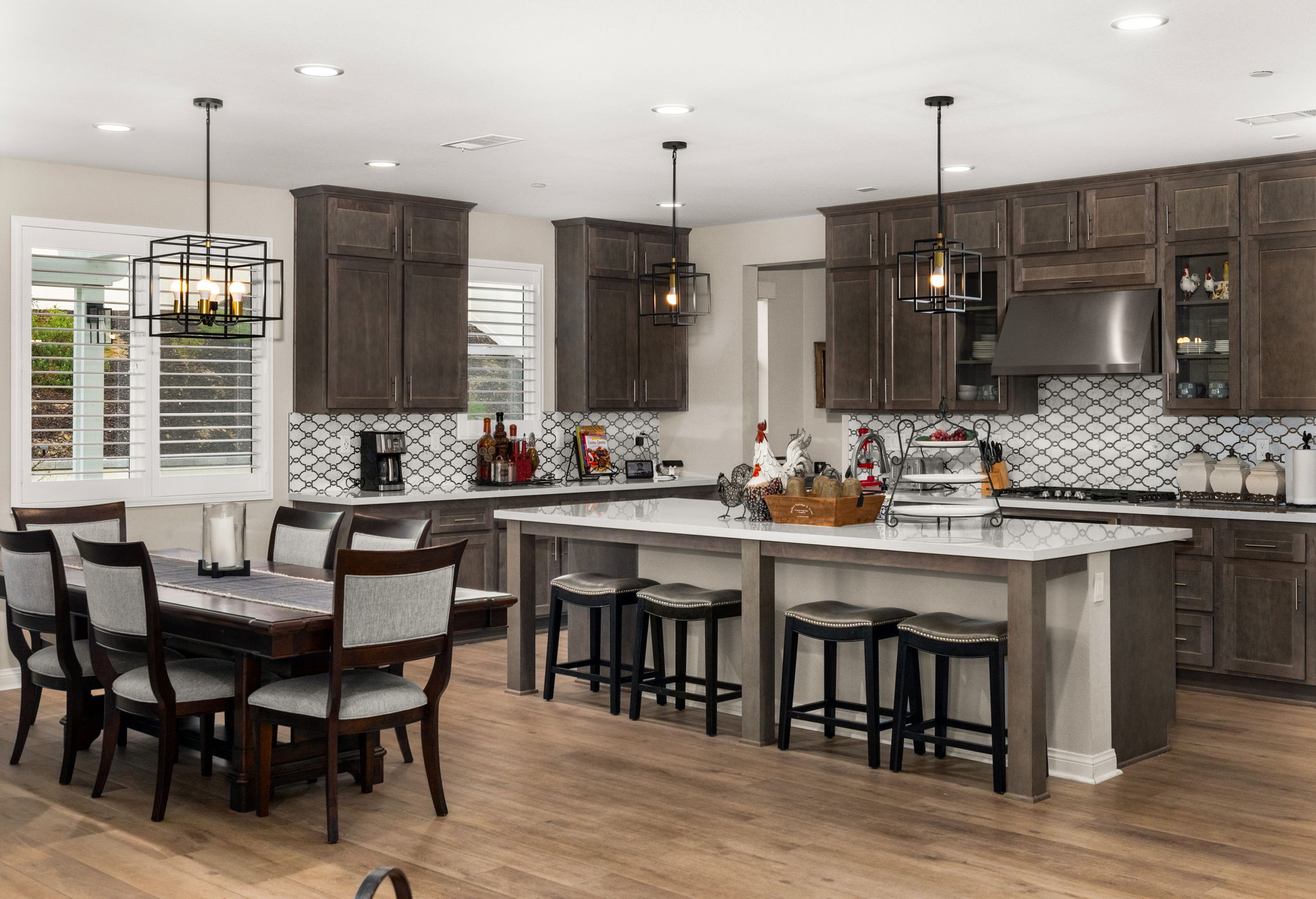 Highly upgraded chef's kitchen with designer backsplash