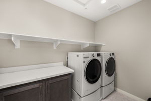 Dedicated laundry room conveniently located upstairs