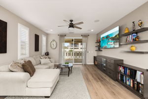 Inside features upgraded flooring, custom paint, and shutters throughout