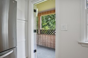 Side entrance and access to large screen porch