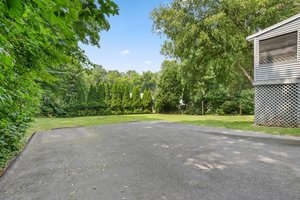 Tree lined private back yard