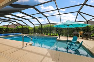 Swimming Pool with Beach Area and Water Fountain