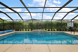Swimming Pool with Beach Area and Water Fountain