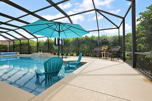 Swimming Pool with Beach Area and Water Fountain