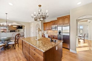Open concept kitchen/family room with large center island