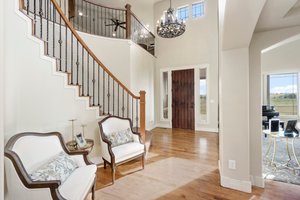 Stunning front entrance with hardwood floors