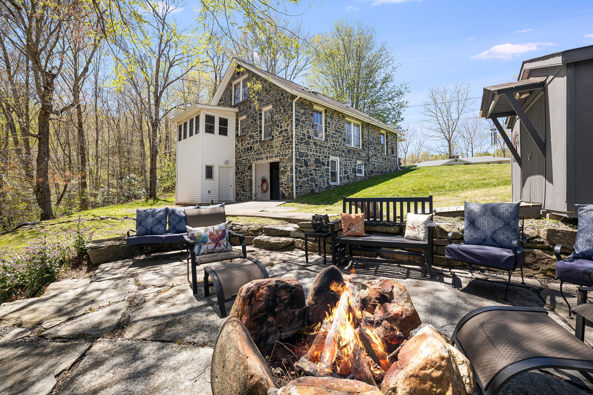 The view of house from the firepit.