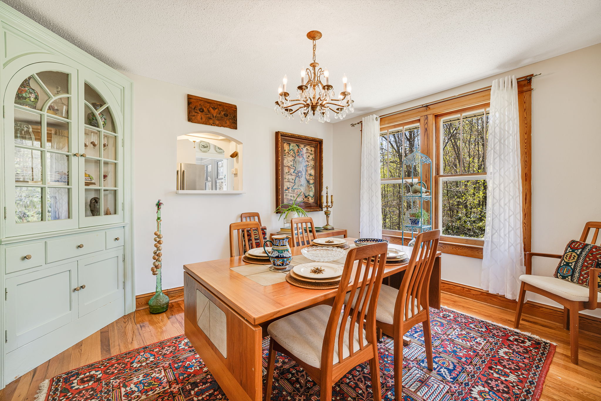 Corner cabinet stays with the dining room.