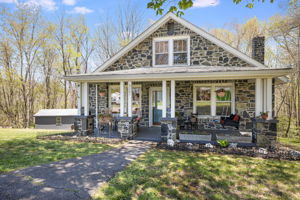 Hornblende Mica Gneiss (of the 550 million year old Ashe Metamorphic Suite variety) stone used to build this rare home!