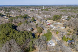 Property in forefront with aerial view of Littleton