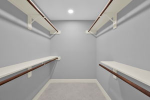 The primary bedroom offers a great-sized Walk-in closet (sits across from Bathroom Vanity area).