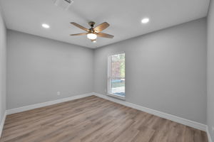 BEDROOM #2 (Looks out to the front yard). Great sized window allows in even more natural light inside the home.