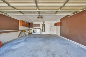 The home's GARAGE was recently painted, and offers a small work area, and multiple PEG BOARDS to hang your tools & other items. (NOTE: Washer/Dryer located in the garage.)