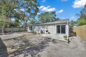 The yard offers plenty of room for any kiddos (and/or pets) to run around outdoors.