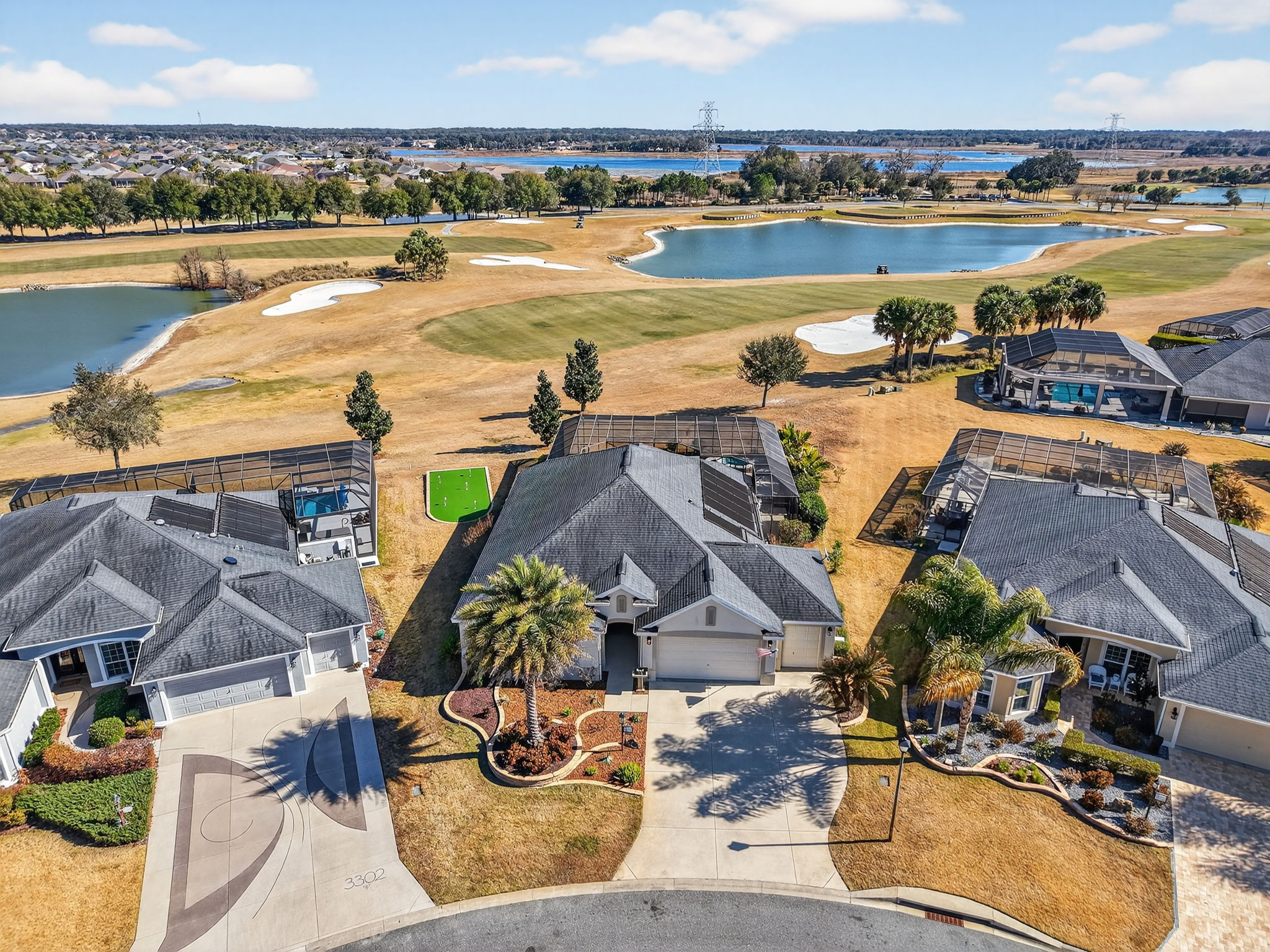 Aerial Front Elevation with Stunning Golf and Water Views!