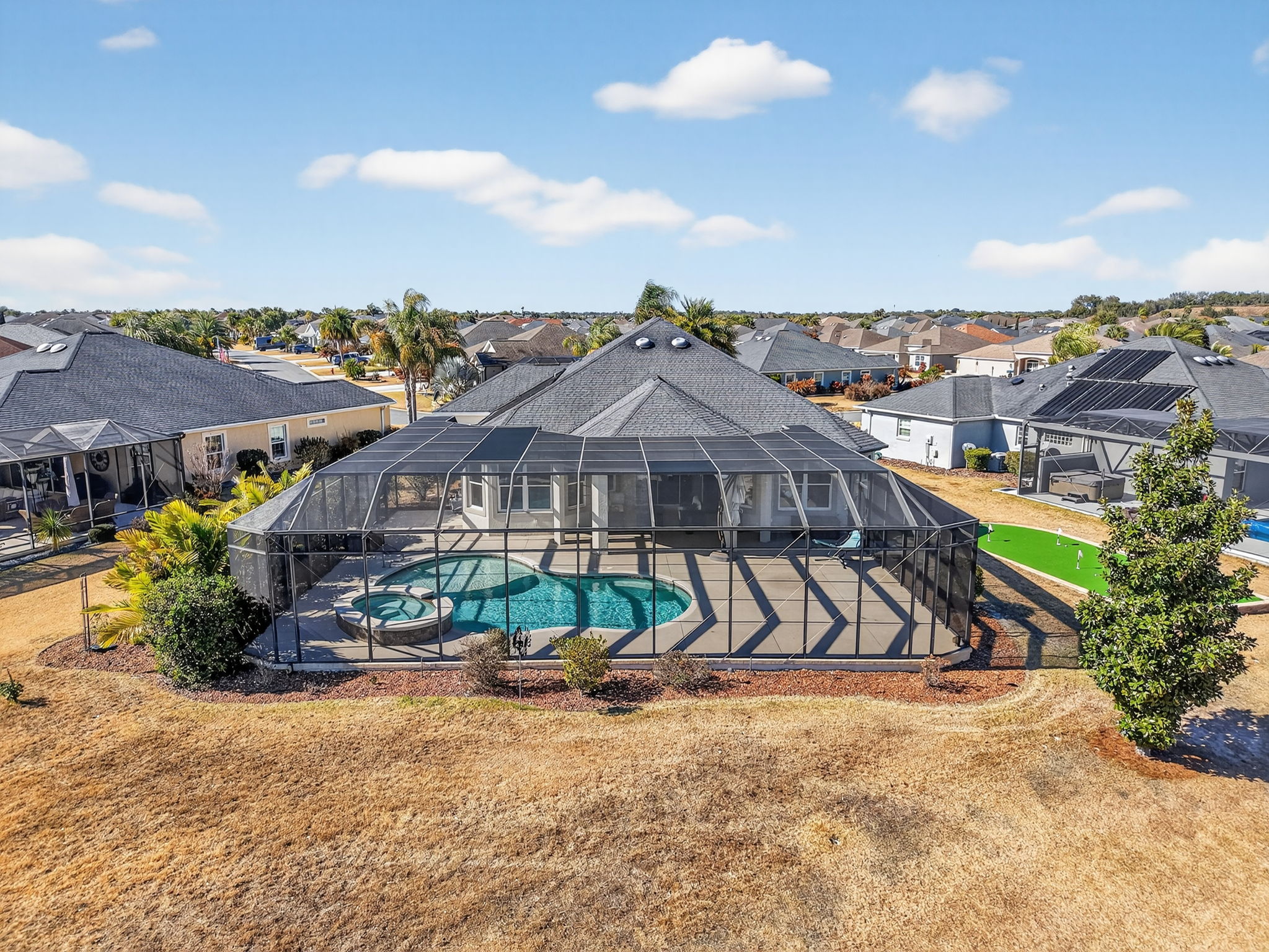 Rear Elevation with Swimming Pool, Spa, and Putting Green