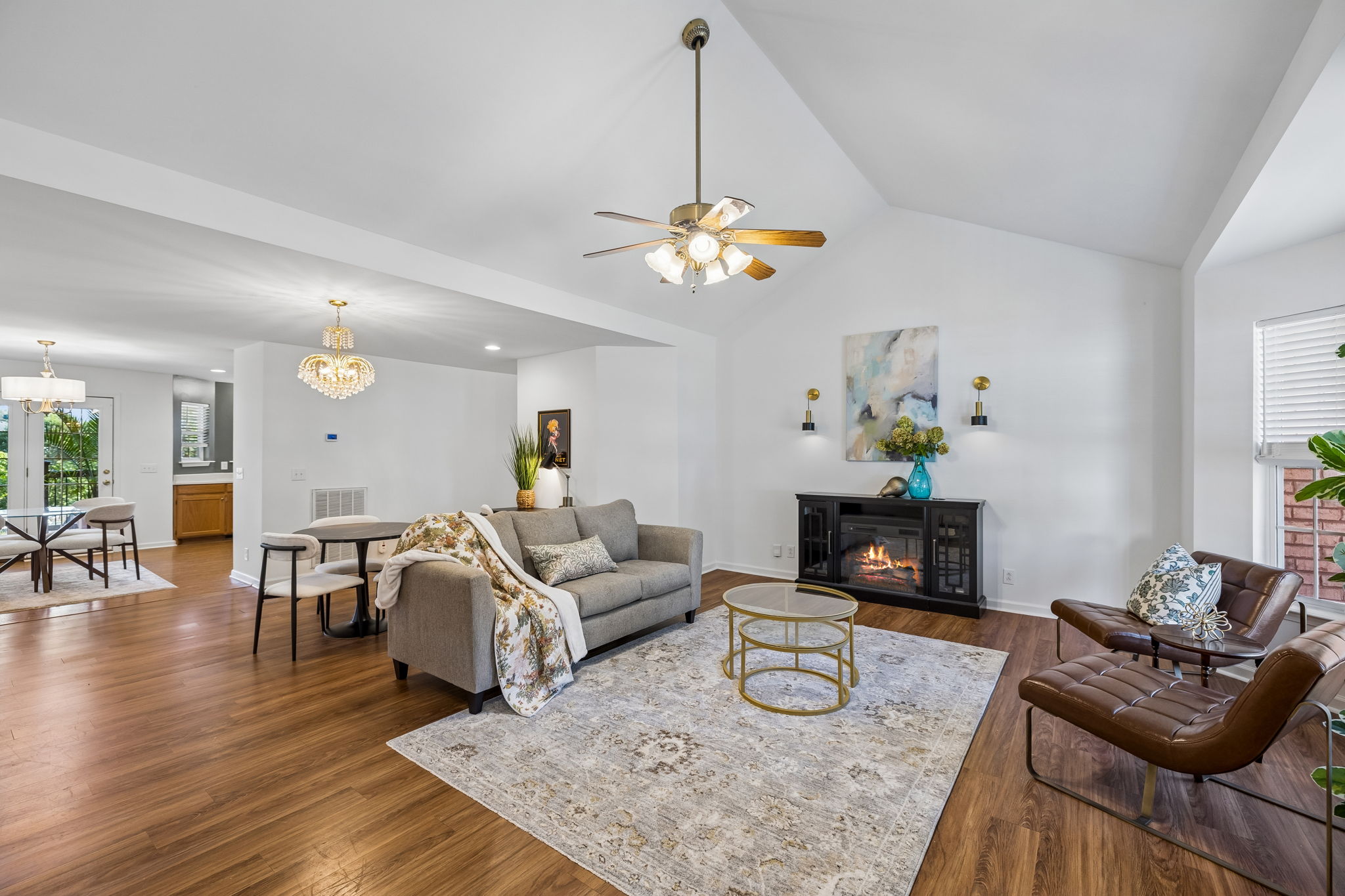 Vaulted ceiling with ceiling fan, bay window, laminate flooring, new light fixtures, all new paint open to eating areas. Combo living dining area large enough for large table and china cabinet.