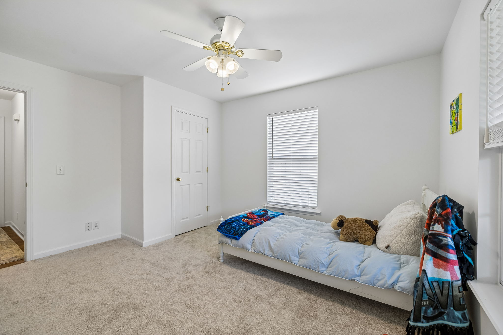 View to hallway and main floor guest bath.