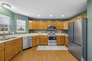 All new stainless steel appliances,  5 burner/griddle smooth top convection oven, French door refrigerator with water dispenser and ice maker.